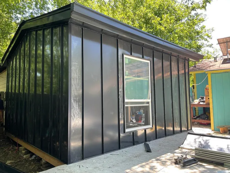 Black standing seam metal wall panels for Metal Roof Installation in Edina