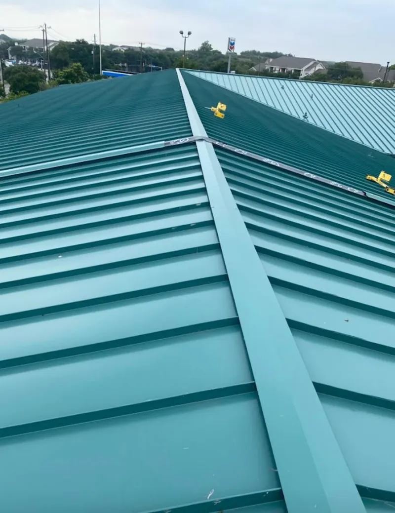 Green commercial metal roof ridge and valley for Metal Roof Repair in Edina
